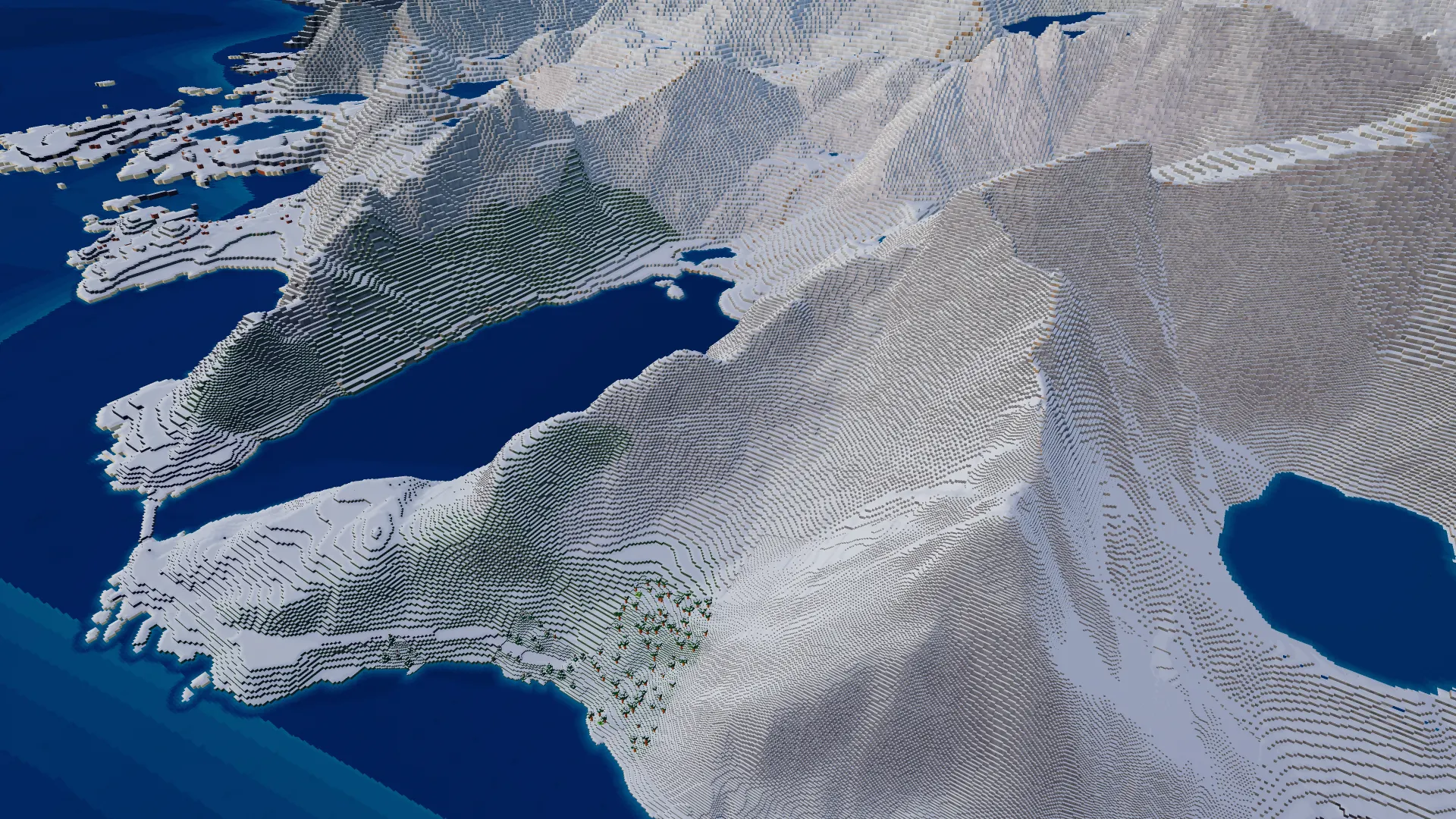 Snow-covered mountains and coastline near Reine