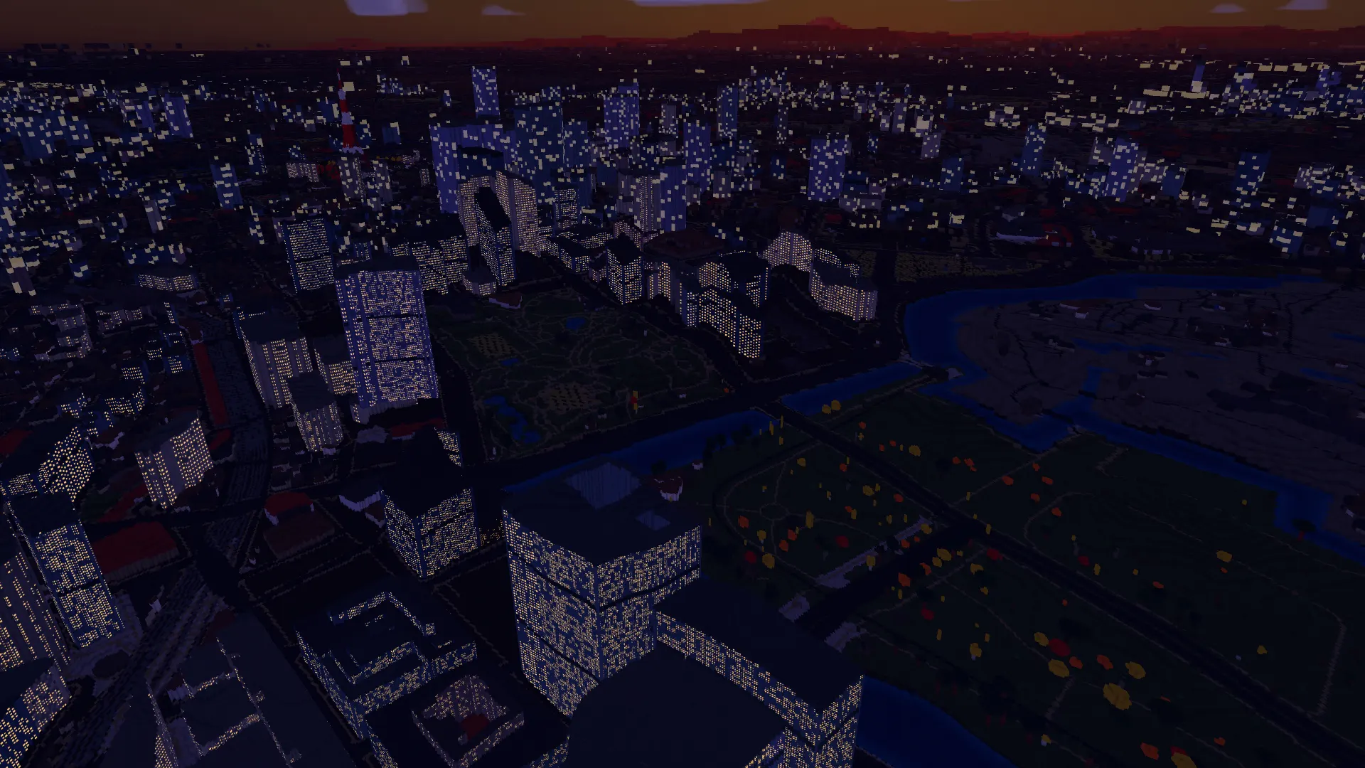 Tokyo buildings with illuminated windows at dusk